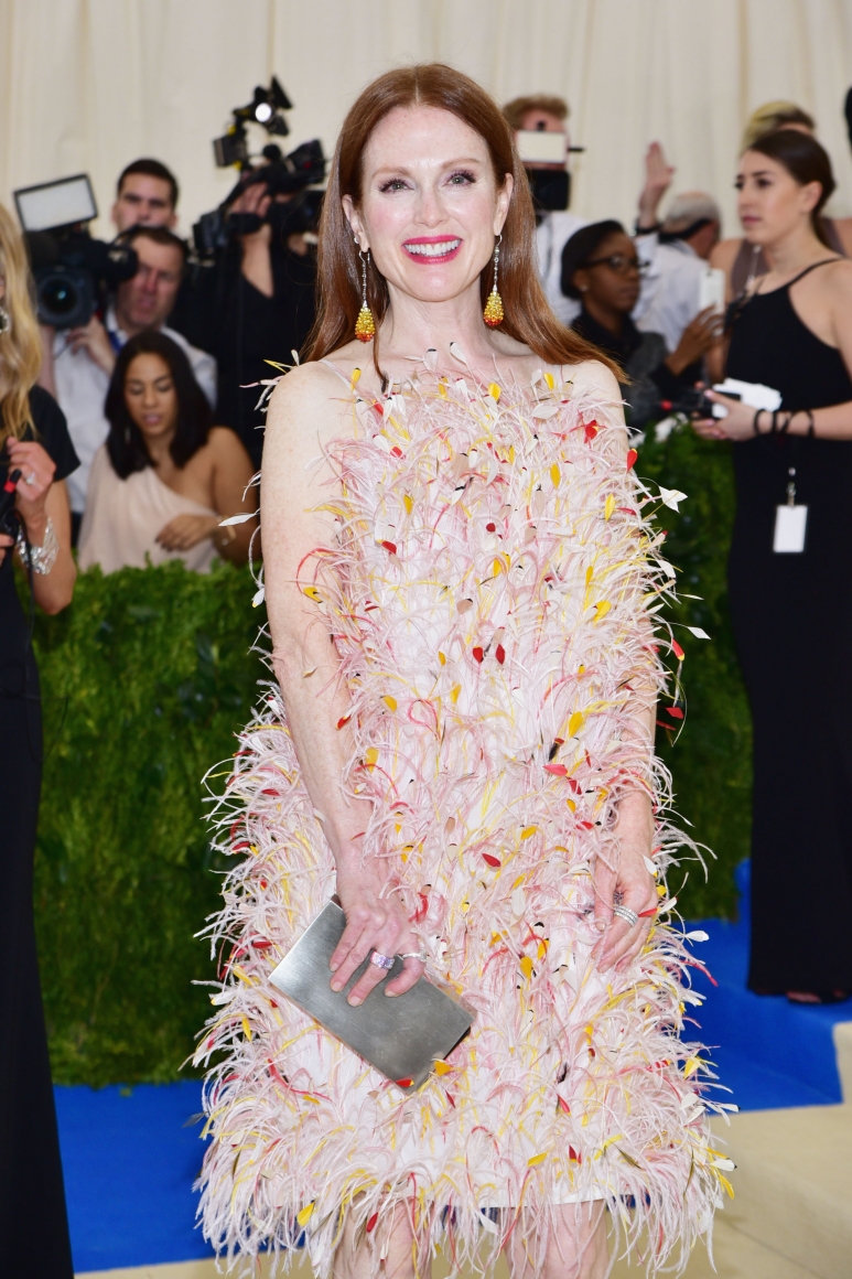 Julianne Moore attends the “Rei KawakuboComme de Gar_on Art of the In-Between” Costume Institute Gala wearing jewelry by Chopard.jpg